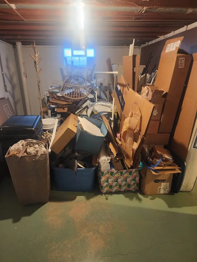 Roll-off dumpster container at job site for 2 Yard Dumpster Rental in Claremont